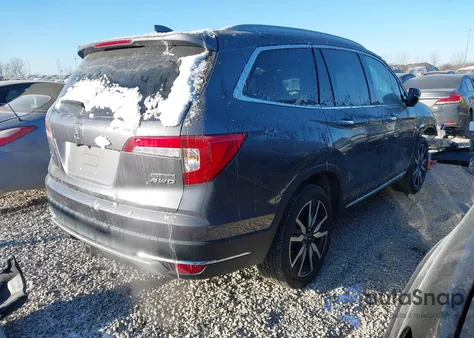 2022 Honda Pilot Touring 7-Passenger z USA, uszkodzony, nr VIN 5FNYF6H61NB024782